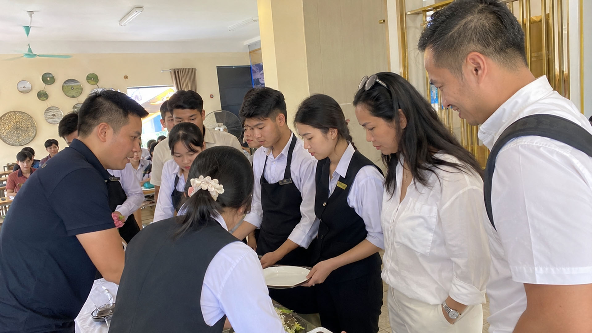 A service-learning day at a hospitality-training school for disadvantaged youth
