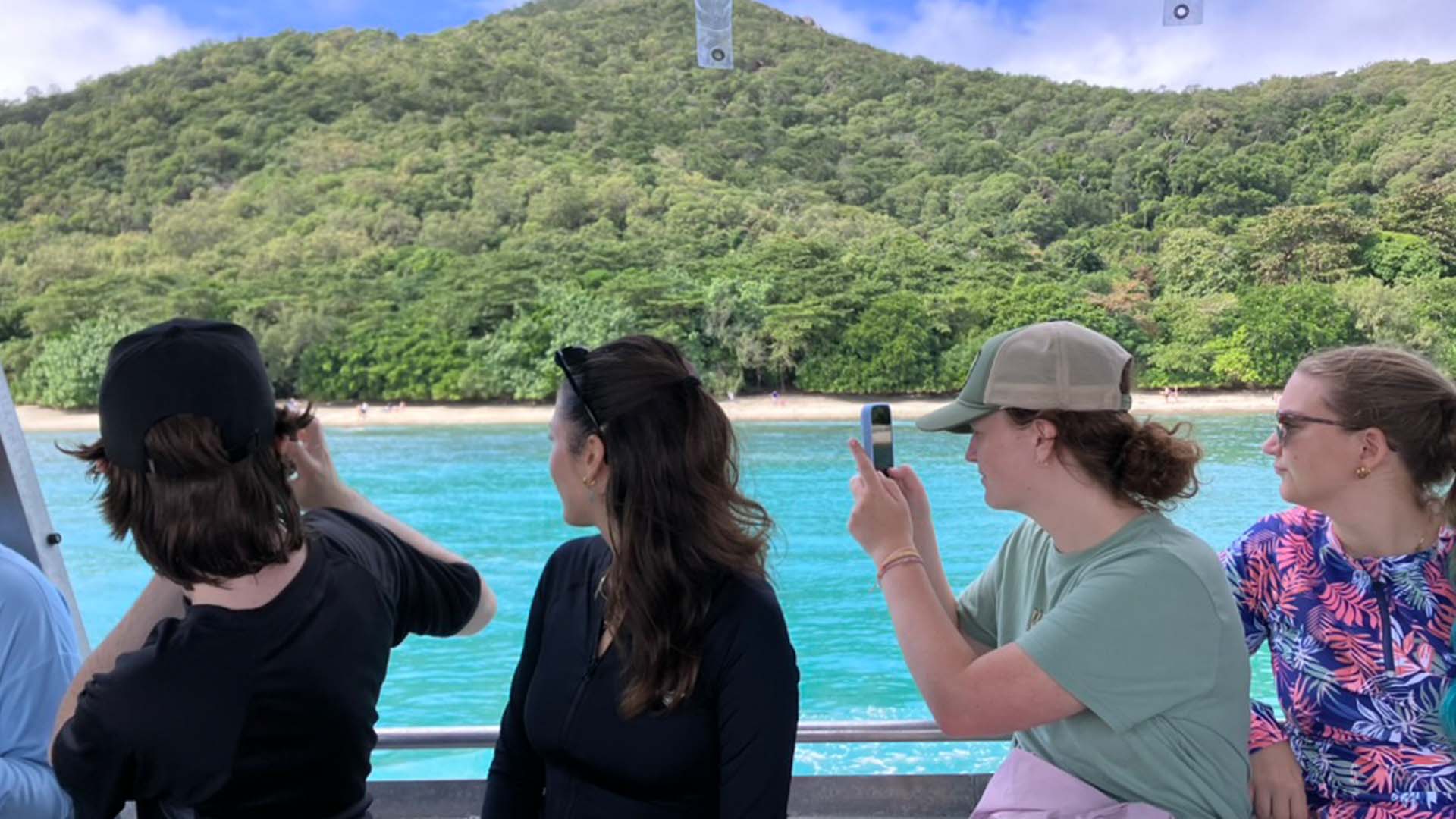A guided day trip to a reef island with a glass-bottom-boat tour